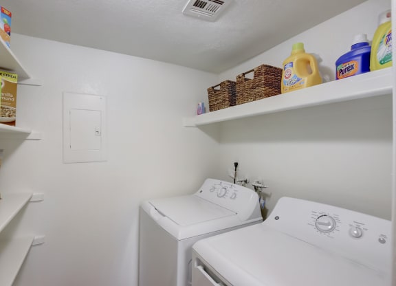 a laundry room with a washer and dryer at Glen at Mesa Apartments, Arizona 85201