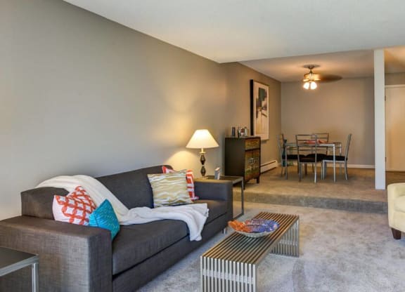Living Area With Kitchen View at Glen at Burnsville, Burnsville