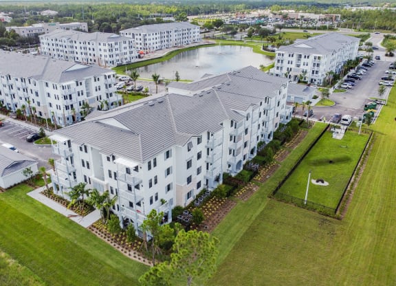 Aerial View of Apartment Buildings and Greenery at Edge75, Naples, FL 34104