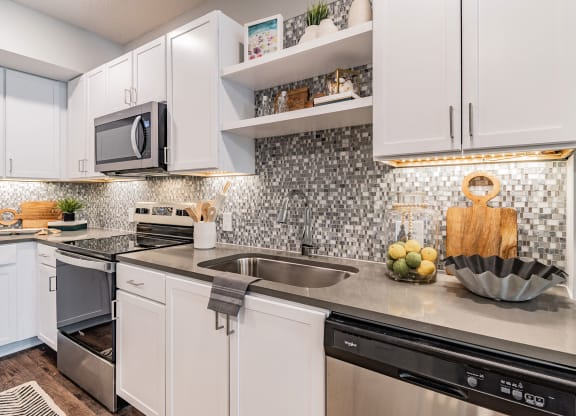 Custom Cabinetry with Under Mounted Lighting at Edge75, Naples, FL