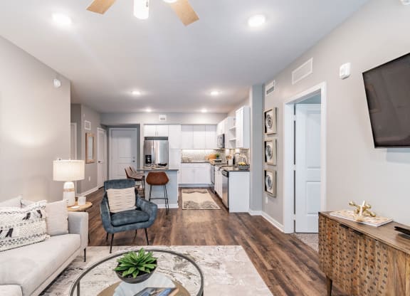 Living Room with Kitchen View at Edge75, Naples, FL