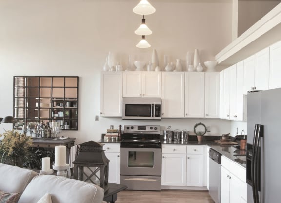 Kitchen with Stainless Steel Appliances at Riverwalk Apartments, Lawrence, MA