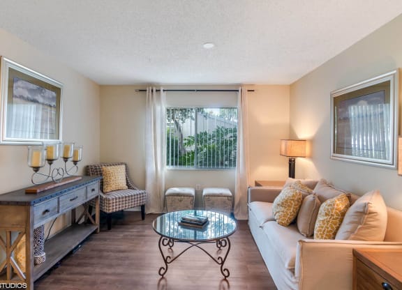 Living Room With Expansive Window at Sarasota South, Bradenton, Florida