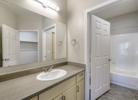 Renovated Bathrooms With Quartz Counters at Sweetwater At Metro North Apartments, Phoenix, Arizona