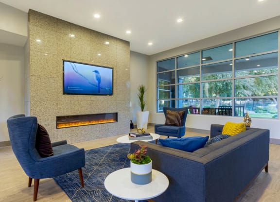 Living Room With TV at Sweetwater At Metro North Apartments, Phoenix, AZ