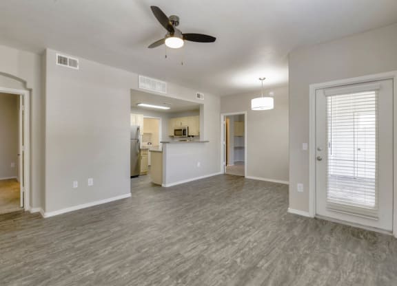 Living Area with Ceiling Fan at Sweetwater At Metro North Apartments, Arizona 85029