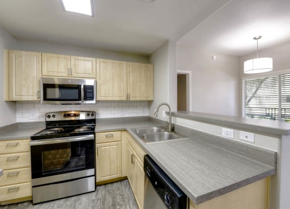 Granite Countertop Kitchen at Sweetwater At Metro North Apartments, Phoenix, Arizona