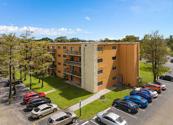 a colorful geometric pattern with a blue sky at Cypress Grove, Lauderhill, FL