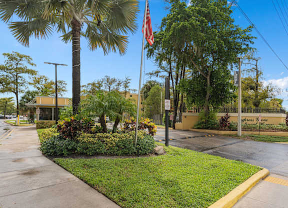 a street with a flag at Cypress Grove, Lauderhill, 33313