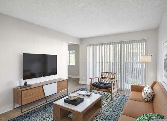 a living room with a couch and a television at Lakeside Villas, Orlando, FL 32817
