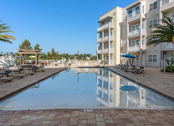 the swimming pool at the resort at longboat key club at Lake Lofts at Deerwood, Florida, 32216