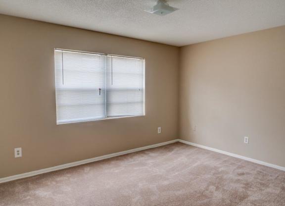 Carpeted Bedroom at Hibiscus Place Apartments, Orlando, Florida