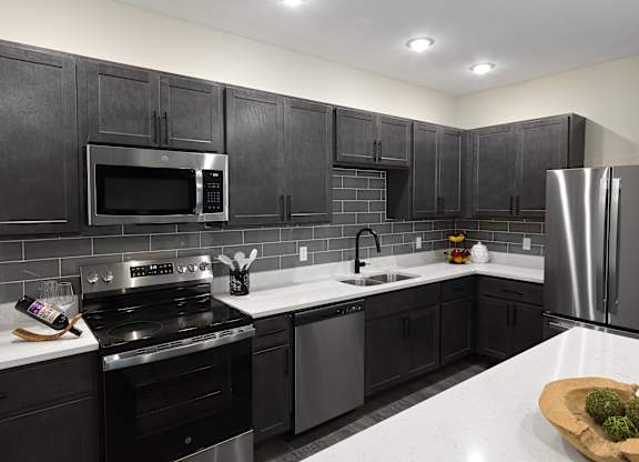 Kitchen with cabinets at Artisan, Illinois