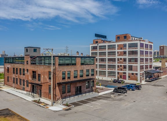 Steelcote Crossing exterior historic brick building with Steelcote Lofts in the background  at Steelcote Square, St. Louis, 63103
