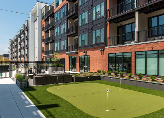 Resident courtyard with putting green  at Chapter at the Streets of St Charles, Saint Charles, 63303