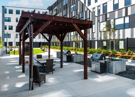 Steelcote Flats grilling stations and pergola with seating at Steelcote Square, St. Louis