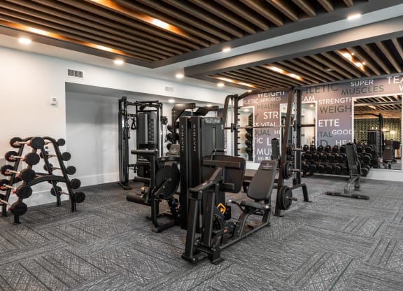 Large modern fitness center with free weights, resistance and strength training machines  at Chapter at the Streets of St Charles, Saint Charles, 63303