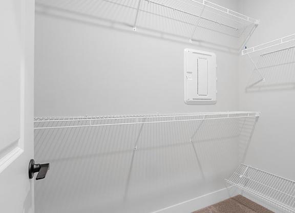 A white empty room with a door and a window. at The Oliver Apartments, Olivette, MO