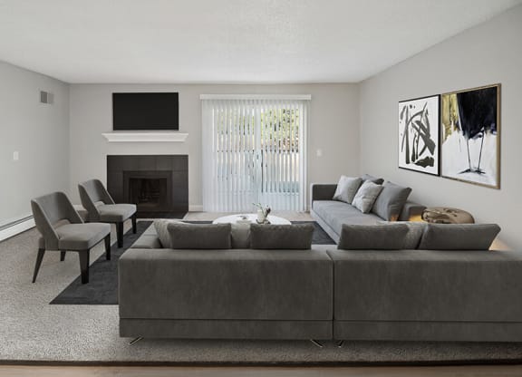 Model Living Room with Fireplace and Carpet at Waterfront Apartments in Lakewood, CO.