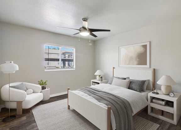 Model Bedroom with Wood-Style Flooring and Window View at Loma Vista Apartments in Las Vegas, NV.