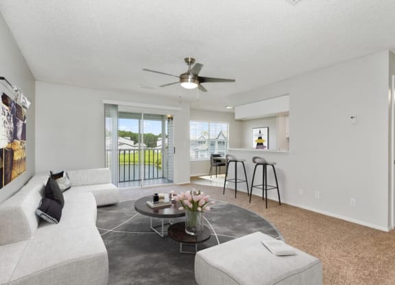 Model living room with kitchen