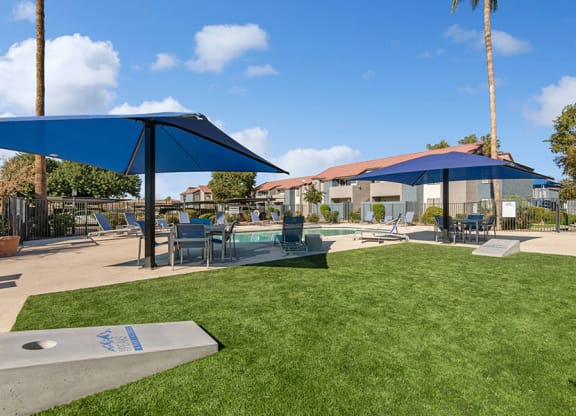 Outdoor Corn Hole Area at Peaks on 4th Apartments in Avondale, AZ.