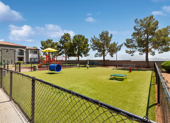 Community Dog Park with Agility Equipment at Loma Vista Apartments in Las Vegas, NV.