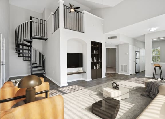 Model living room with spiral staircase