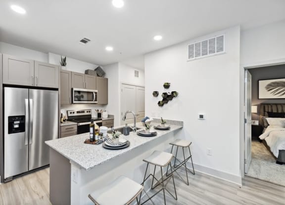 Model kitchen with bar seating