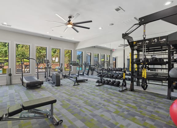 Community Fitness Center with Equipment at Retreat at Stonecrest Apartments located in Lithonia, GA.