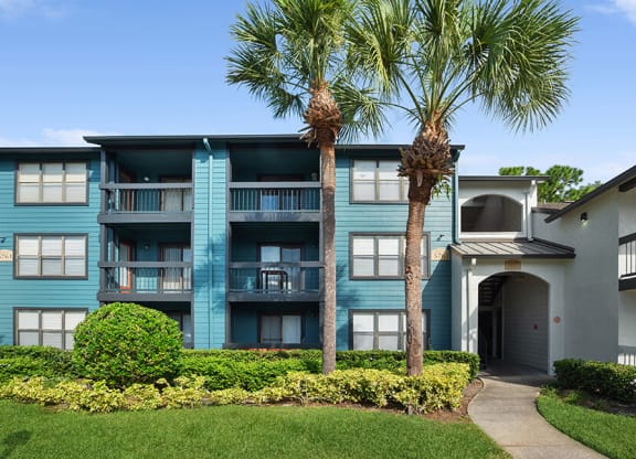 Exterior Community Building and Landscape at Fountains Lee Vista Apartments in Orlando, FL.