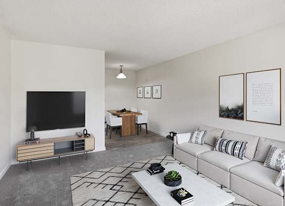 Model Living Room with Carpet and View of Dining Room at Walnut Creek Apartments located in Walnut Creek, CA.