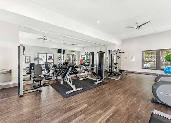 Community Fitness Center with Equipment at Lake Cameron Apartments located in Apex, NC.