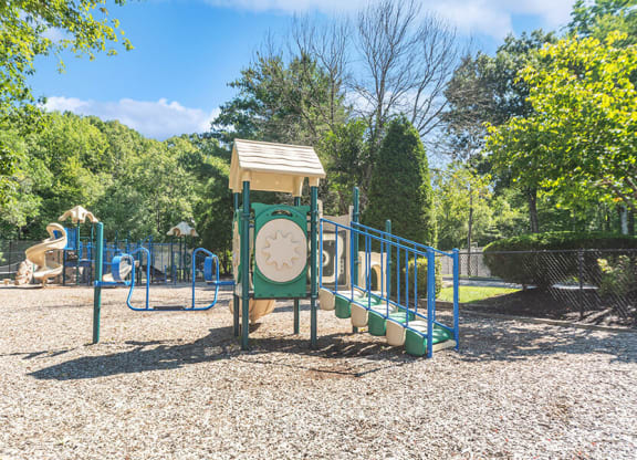 Community Playground with Slide at The Commons at Haynes Farm Apartments in Boston, MA.