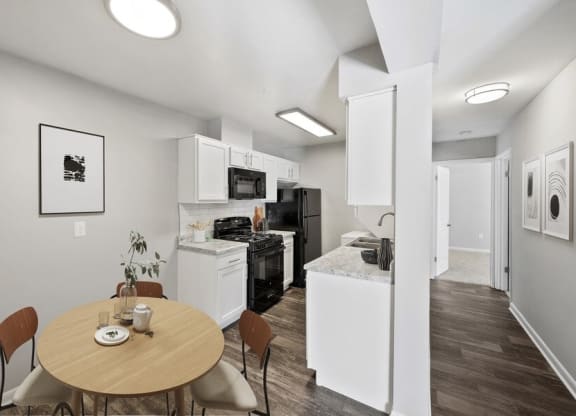 Model dining area next to kitchen