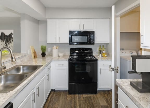Model kitchen showcasing new appliances at Cobblestone, Arlington, Texas
