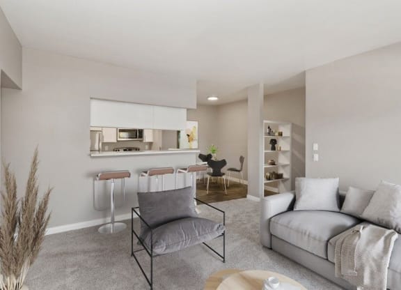Model living room and bar seating kitchen