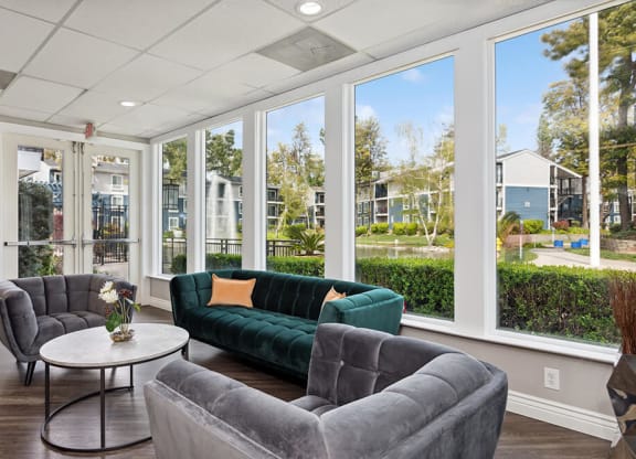 Community Clubhouse with Lounge Furniture at Fountains at Point West Apartments in Sacramento, CA.