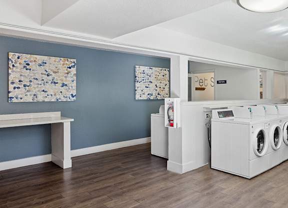 Community Laundry Center at Los Gatos Landing Apartments located in San Jose, CA.
