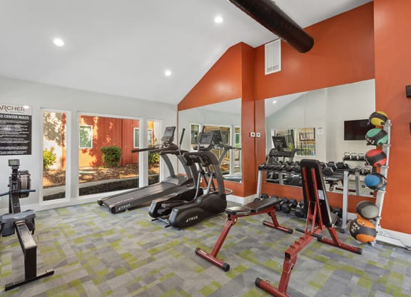 Community Fitness Center with Equipment at The Archer Apartments in Sacramento, CA.