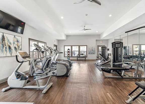 Community Fitness Center with Equipment at Lake Cameron Apartments located in Apex, NC.