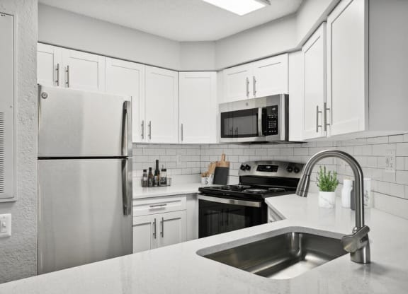 Model kitchen with stainless steel appliances