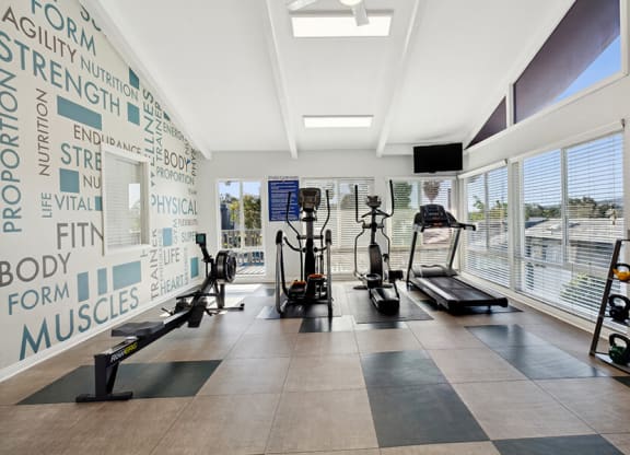 Community Fitness Center with Equipment at Colonnade at Fletcher Hills Apartments in El Cajon, CA.