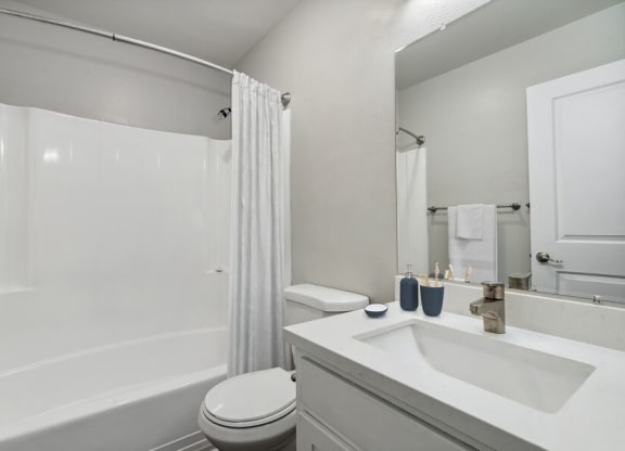 Model bathroom with tub and sower