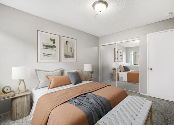 Model bedroom with queen-sized bed