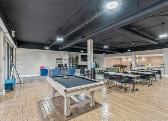 Clubhouse game room with pool table