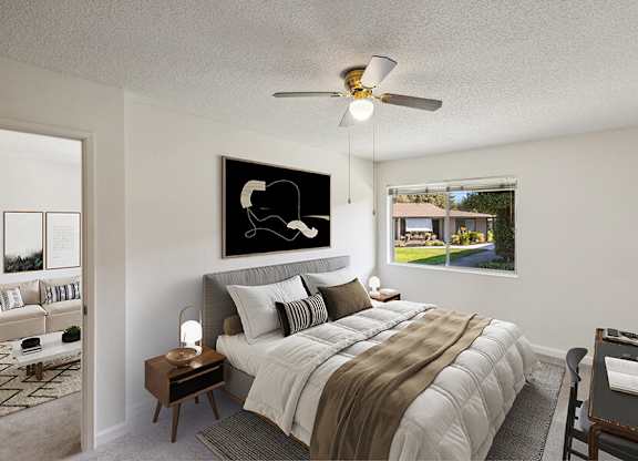 Model Bedroom with Carpet and Window View at Walnut Creek Apartments located in Walnut Creek, CA.