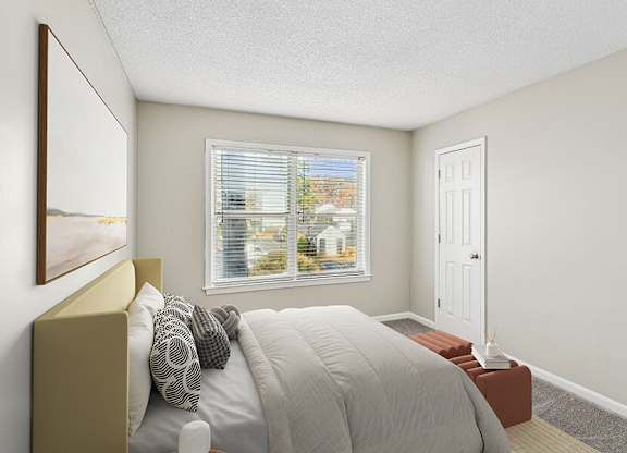 Model Bedroom with Carpet and Window View at Element 41 Apartments located in Marietta, GA.