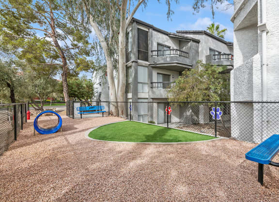 Community Dog Park with Agility Equipment at Crystal Creek Apartments in Phoenix, AZ.
