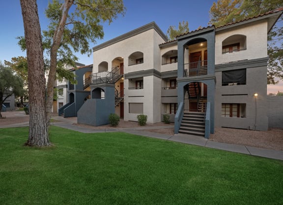 Exterior Community Building and Landscape at Country Club Verandas Apartments located in Mesa, AZ.
